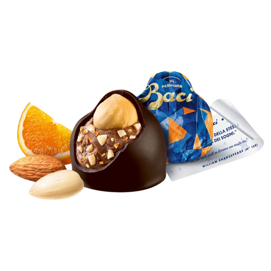 Chocolate truffle with nuts, orange slice, and Baci chocolate packaging on a white background